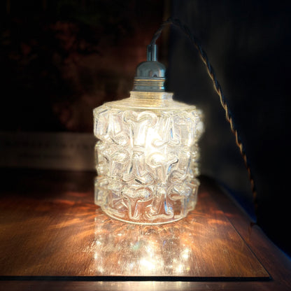 Upcycled portable lamp in facetted glass